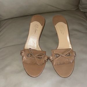 Cole Haan slide heels.